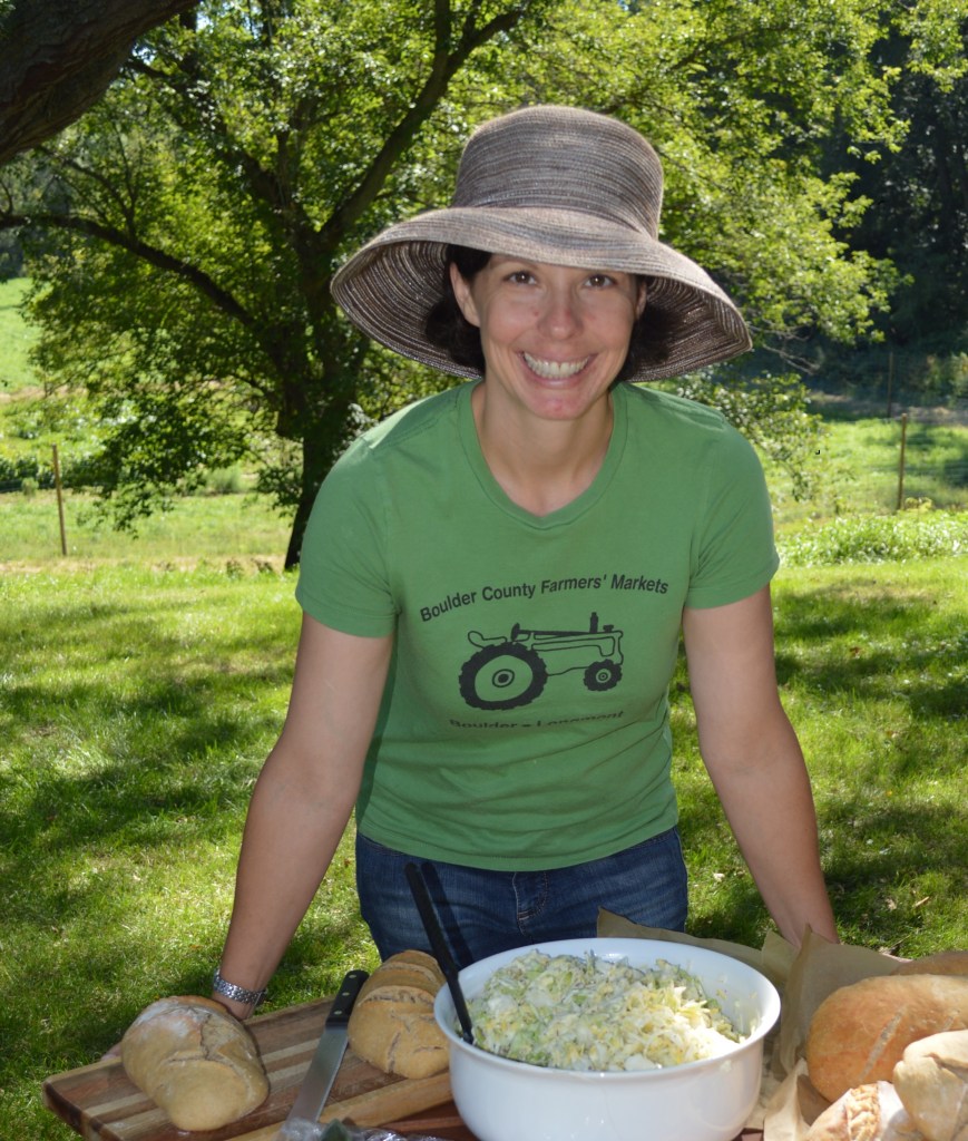 Angela hosting an on-farm picnic for friends, family, and volunteers in 2014.