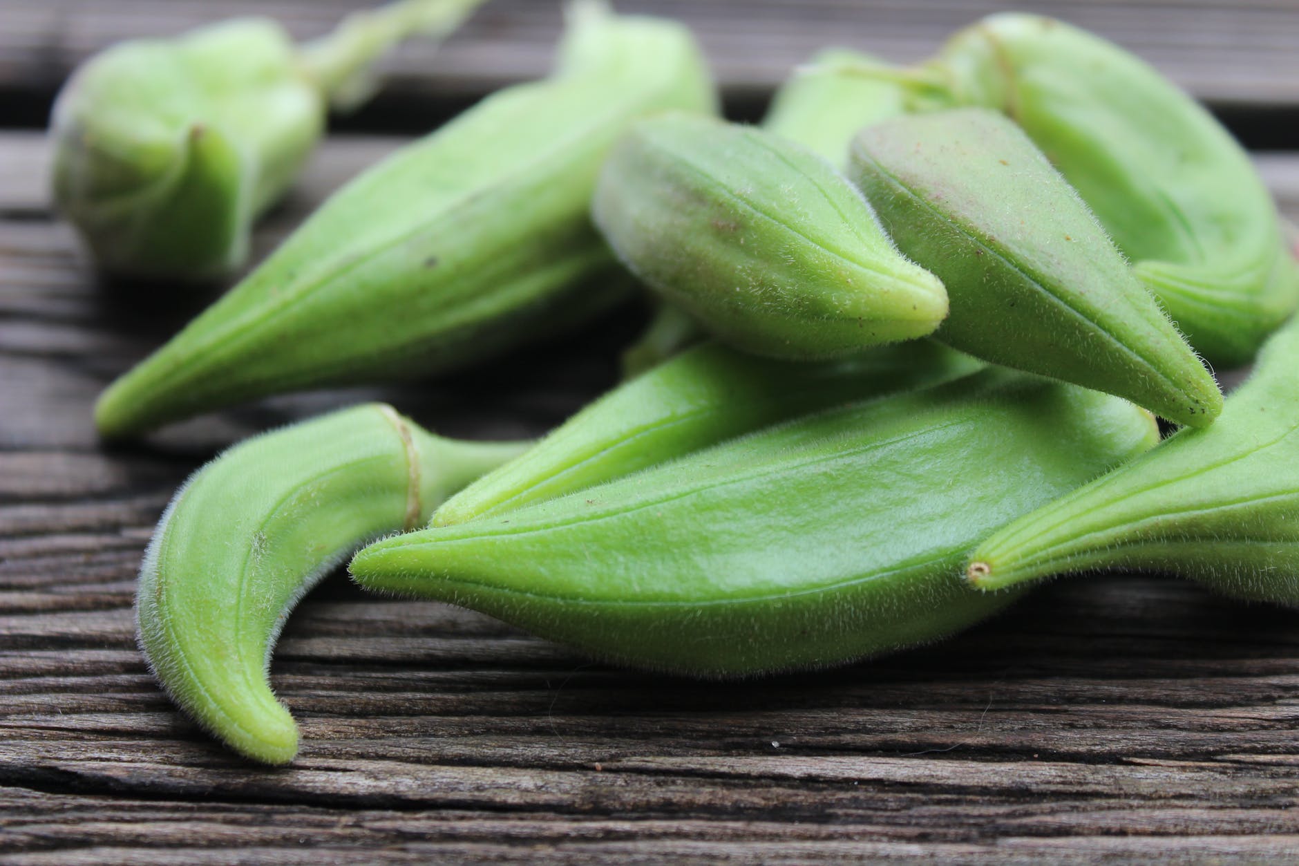 Okra on a cutting board.